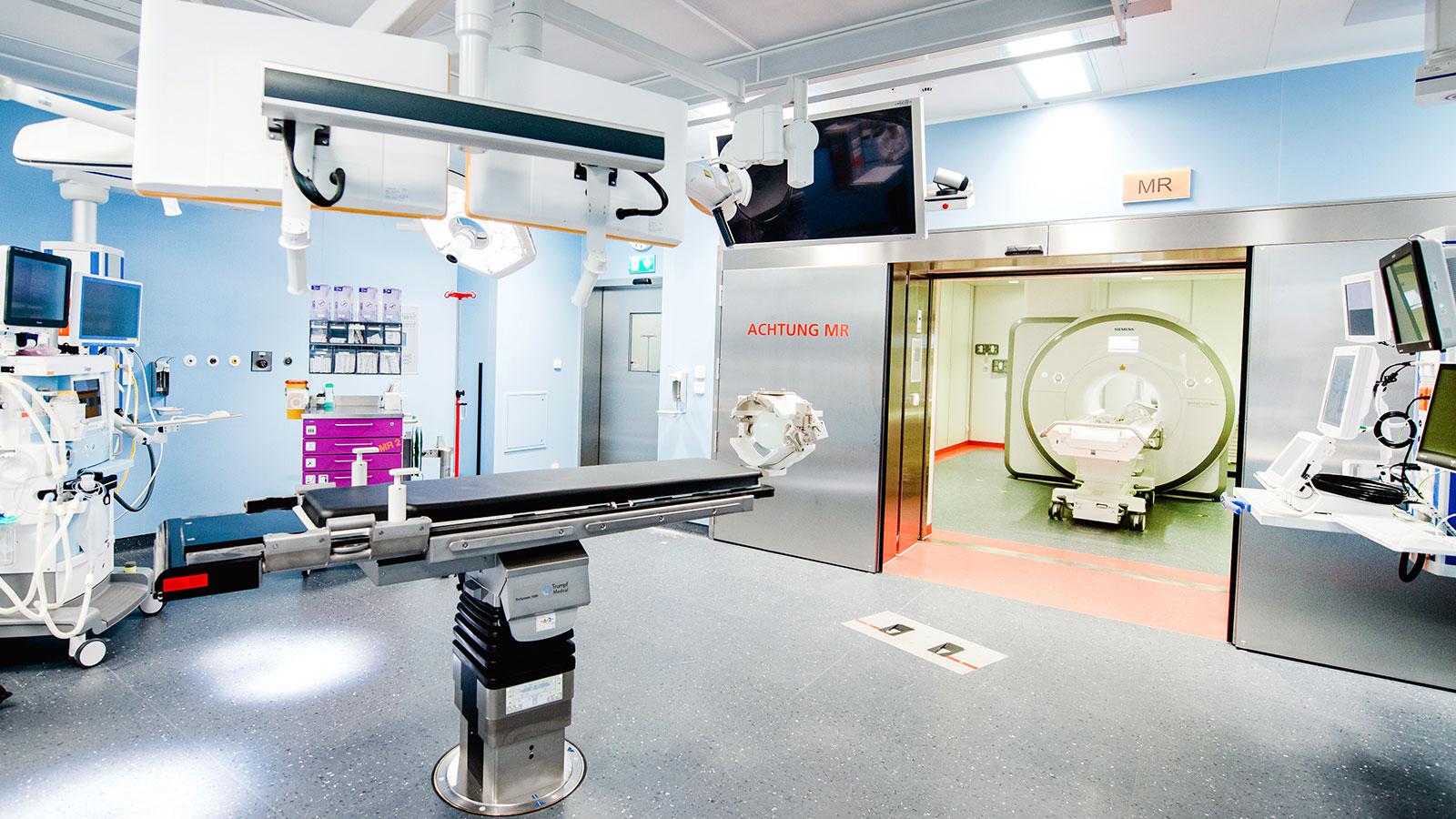 Photo of the operating theater with MRI system in the background