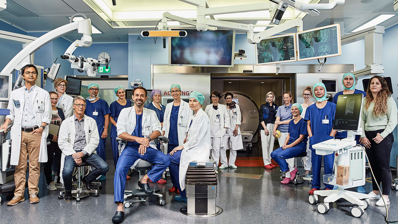 Group photo of the neuro-oncology staff in the operating room